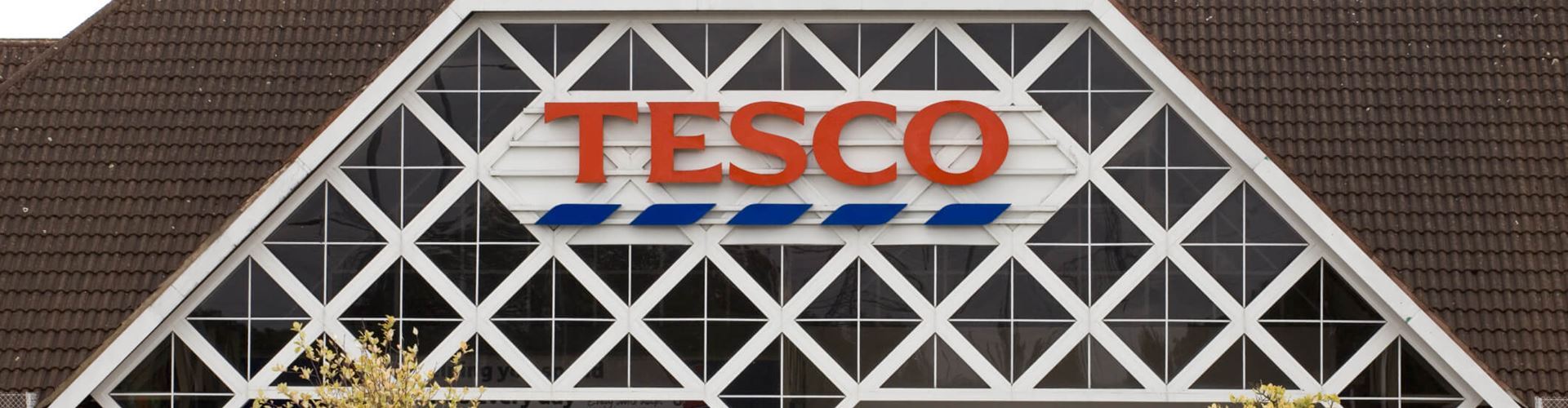Tesco records 55% drop in profits